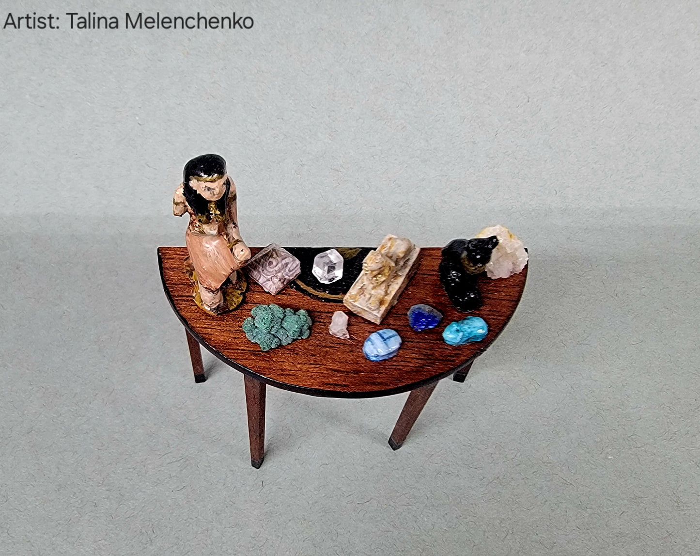 Half Round Table with Artifacts and Geological Items