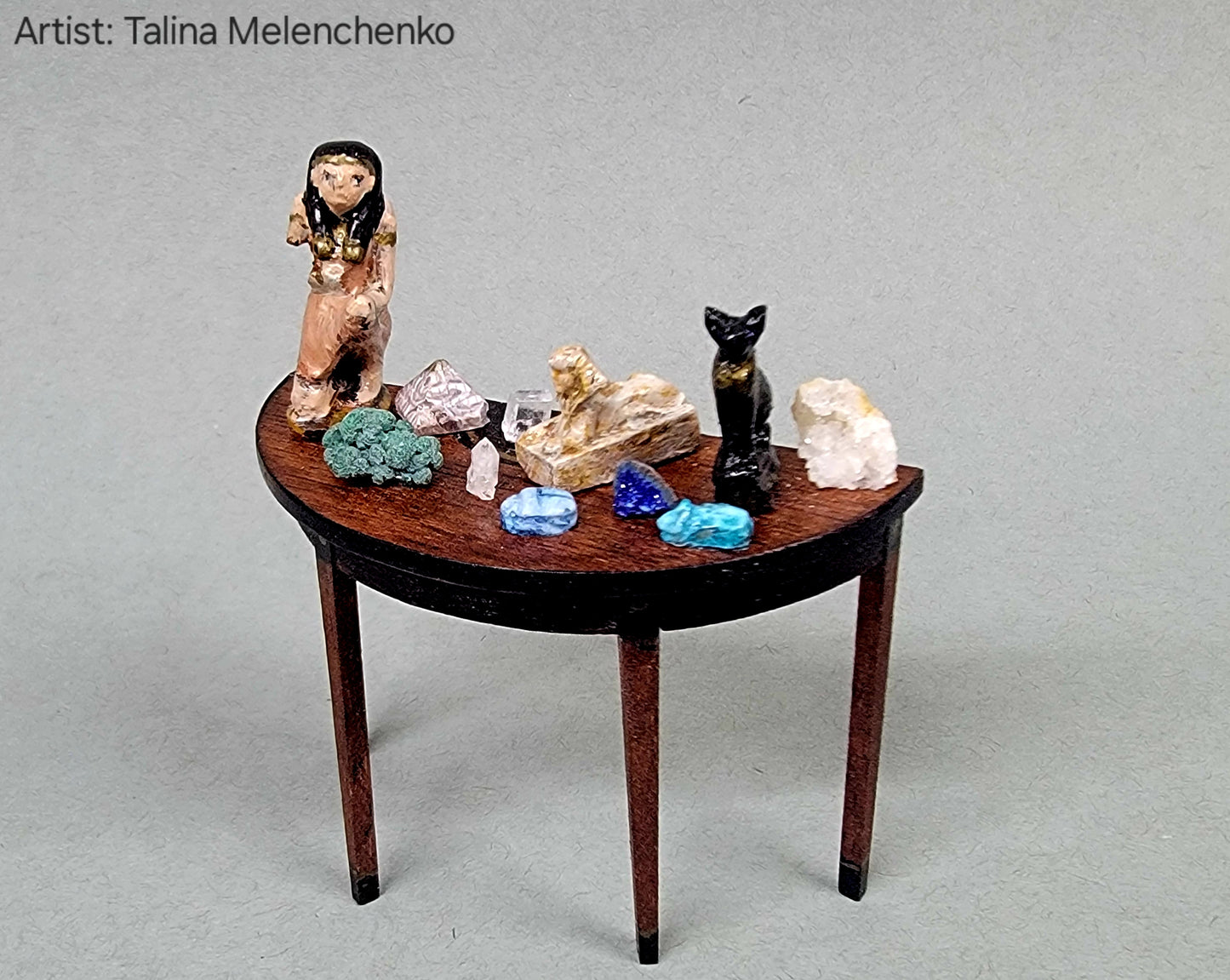 Half Round Table with Artifacts and Geological Items