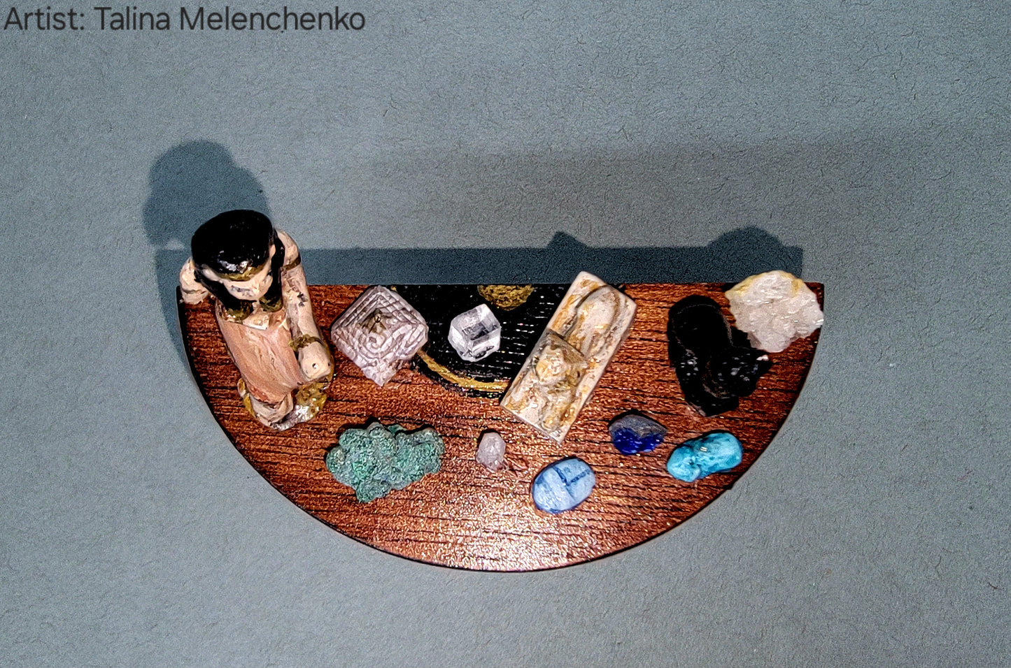 Half Round Table with Artifacts and Geological Items