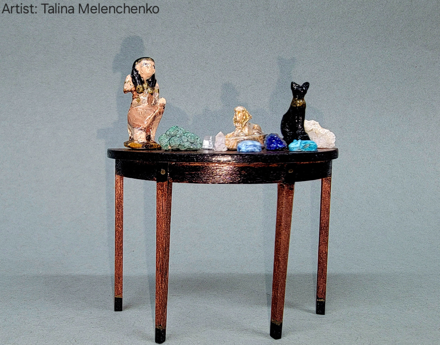 Half Round Table with Artifacts and Geological Items